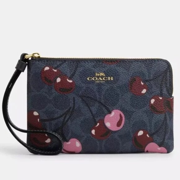 NWT - Corner Zip Wristlet In Signature Canvas W/ Cherry Print Color: Gold/Denim - Picture 1 of 6